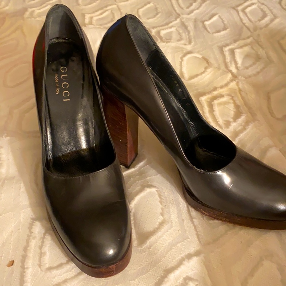Black Gucci shoes with mahogany colored heel 9
